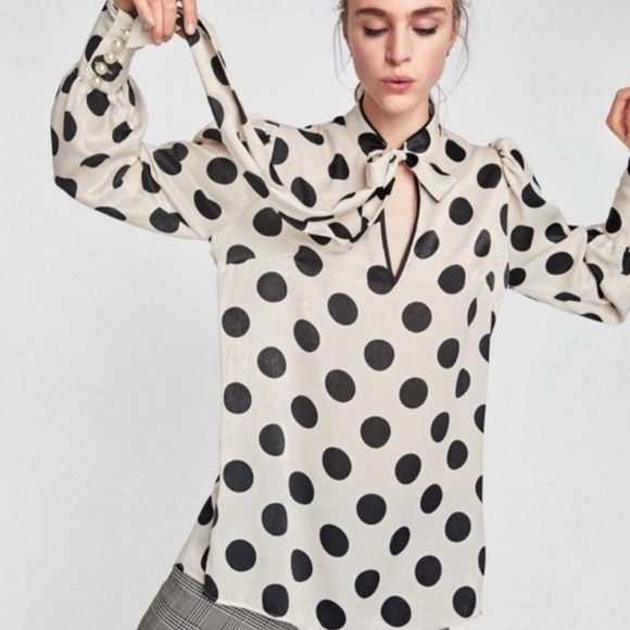 large polka dot blouse